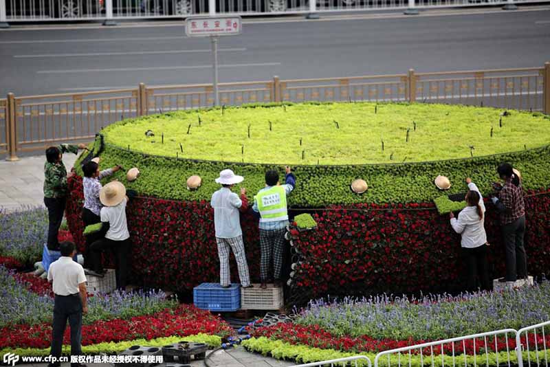 Canteiros de flores no centro de Beijing para celebrar aniversário da vitória contra agress?o japonesa