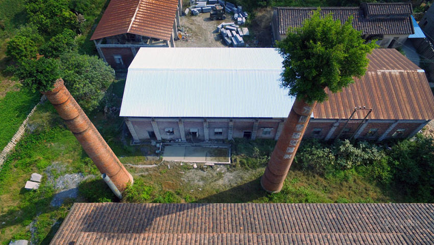 Chaminé veste chapéu verde no sudeste da China