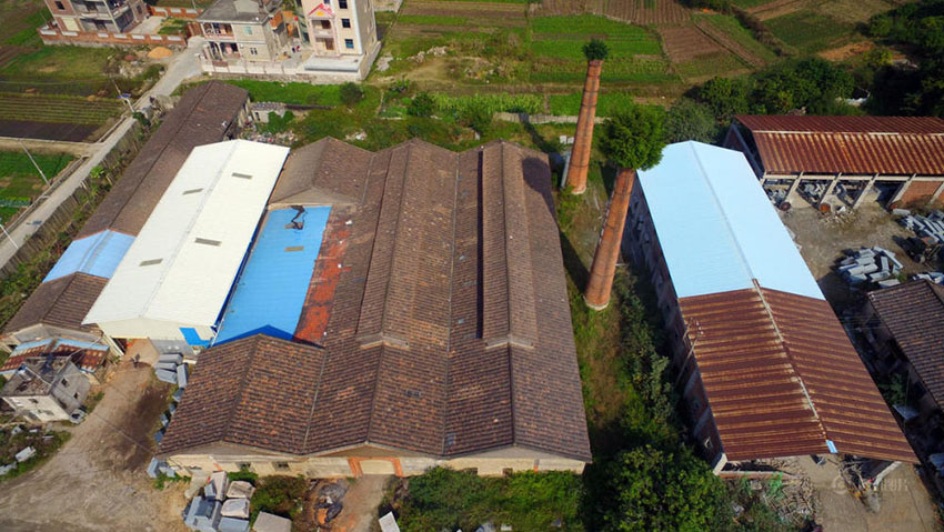 Chaminé veste chapéu verde no sudeste da China