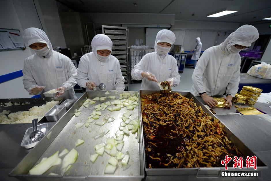 Galeria: Processo de produ??o das refei??es servidas a bordo dos avi?es