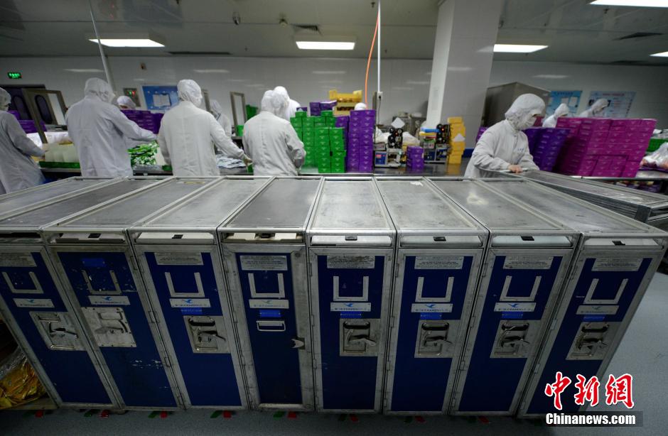 Galeria: Processo de produ??o das refei??es servidas a bordo dos avi?es