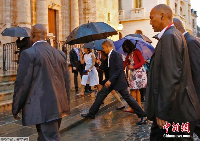 Obama chega a Cuba e inaugura nova era nas rela??es entre os dois lados