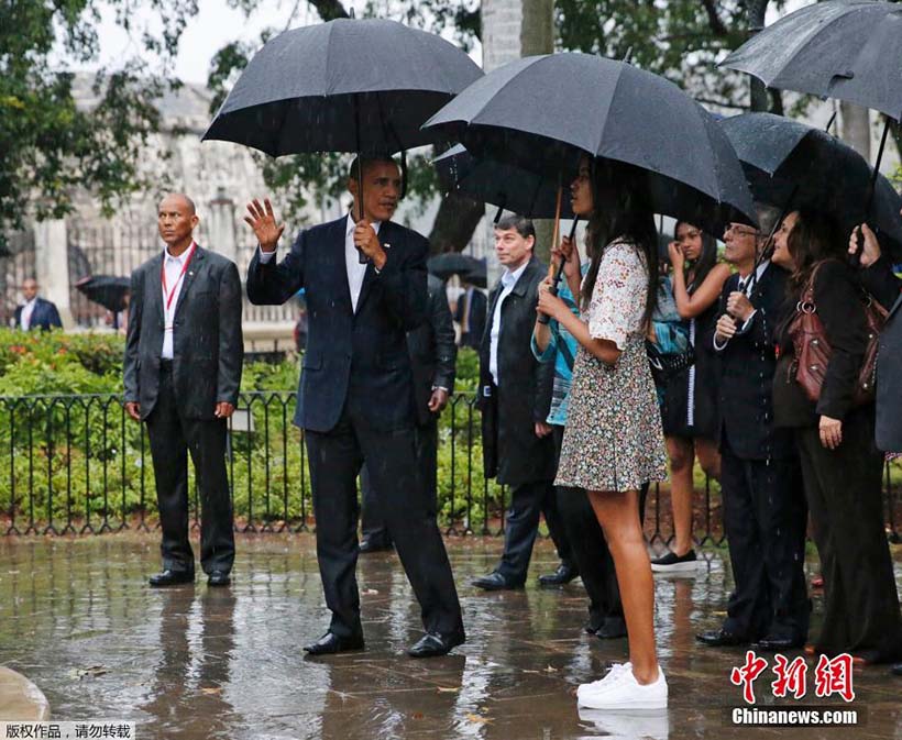 Obama chega a Cuba e inaugura nova era nas rela??es entre os dois lados