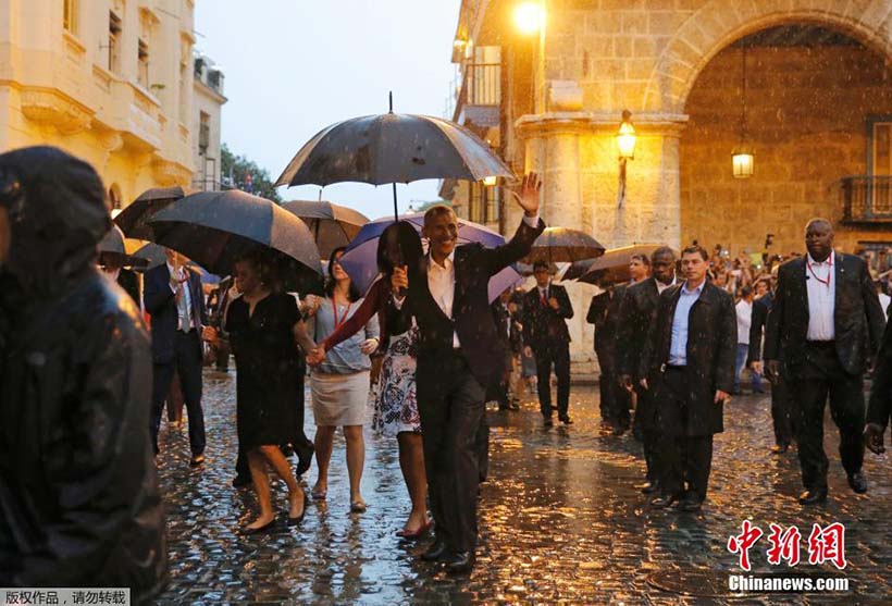 Obama chega a Cuba e inaugura nova era nas rela??es entre os dois lados