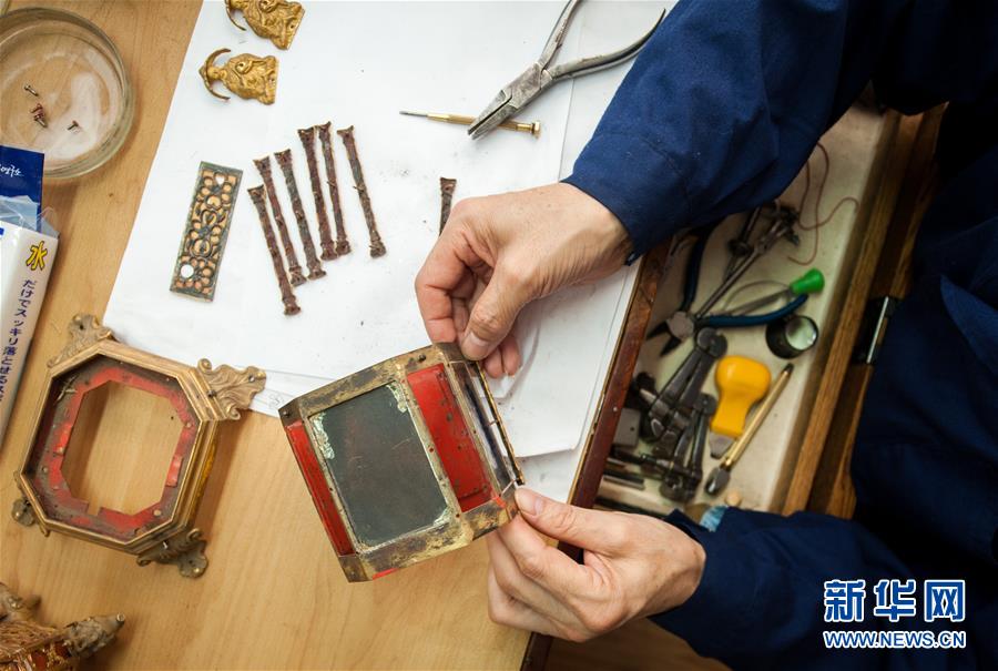 Técnico de relógios testemunha ciclo de gera??es na Cidade Proibida