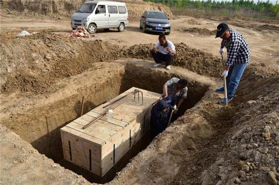 Descobertos caix?es de 3 mil anos no centro da China