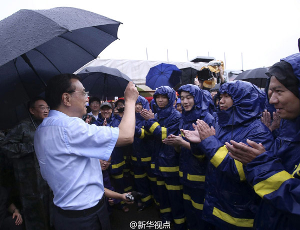 Primeiro-ministro chinês visita regi?es inundadas