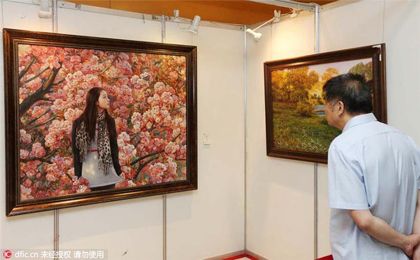 Cole??o de pinturas contemporaneas da RPDC s?o exibidas em Nantong