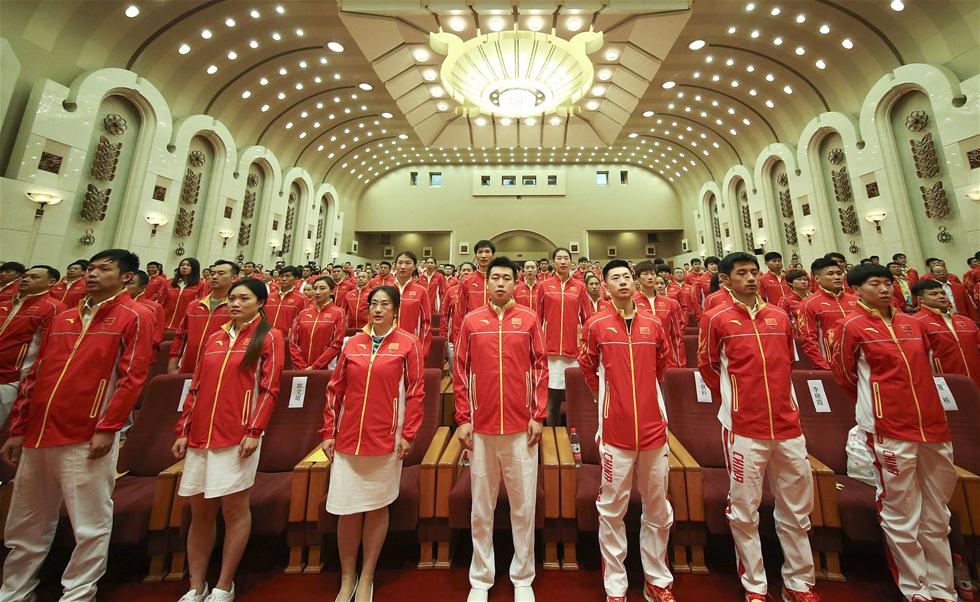 Delega??o olímpica chinesa recebida em cerim?nia no Grande Sal?o do Povo