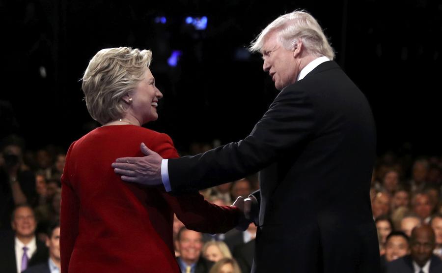 Política externa, economia e tens?es raciais: A colis?o entre Trump e Clinton no primeiro debate presidencial