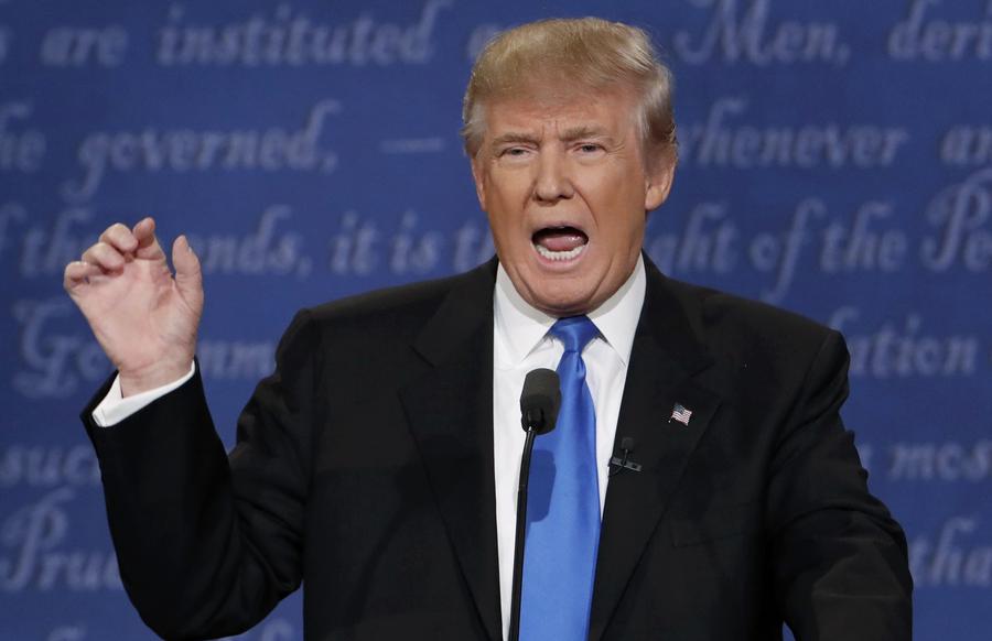 Política externa, economia e tens?es raciais: A colis?o entre Trump e Clinton no primeiro debate presidencial