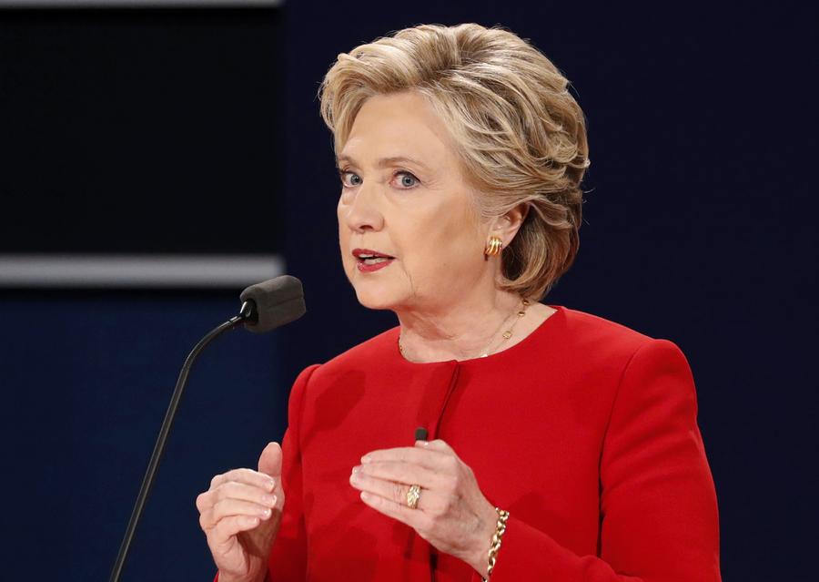 Política externa, economia e tens?es raciais: A colis?o entre Trump e Clinton no primeiro debate presidencial