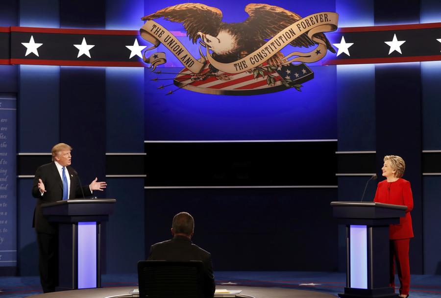 Política externa, economia e tens?es raciais: A colis?o entre Trump e Clinton no primeiro debate presidencial