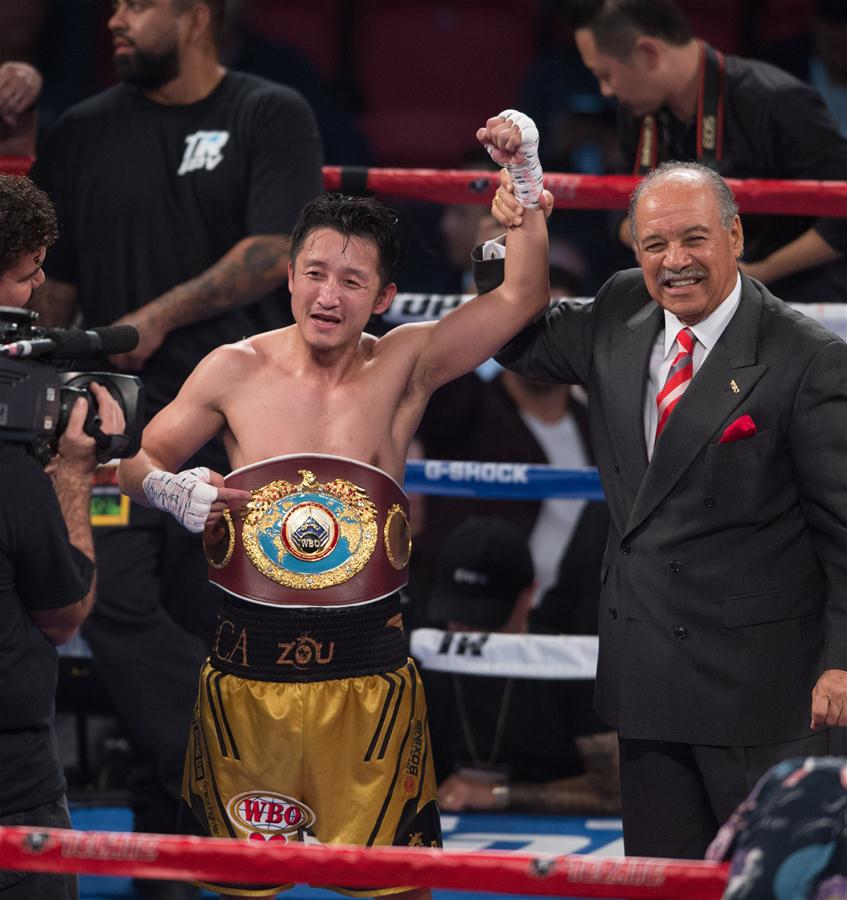 Chinês Zou Shiming é campe?o mundial da categoria peso-mosca da WBO