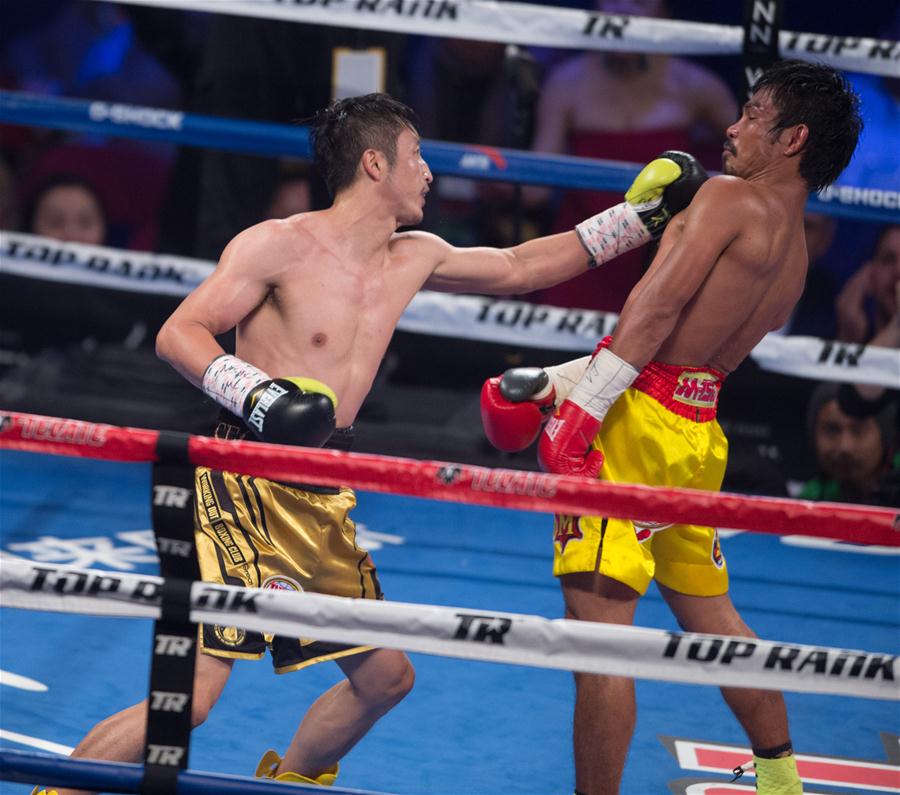 Chinês Zou Shiming é campe?o mundial da categoria peso-mosca da WBO