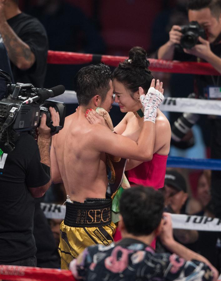 Chinês Zou Shiming é campe?o mundial da categoria peso-mosca da WBO