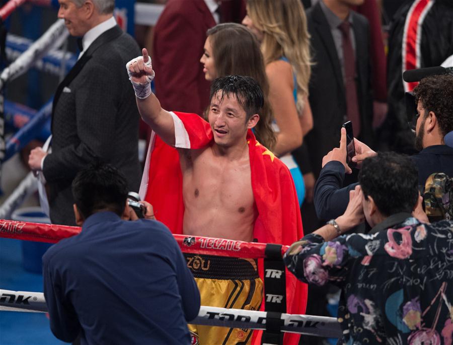 Chinês Zou Shiming é campe?o mundial da categoria peso-mosca da WBO