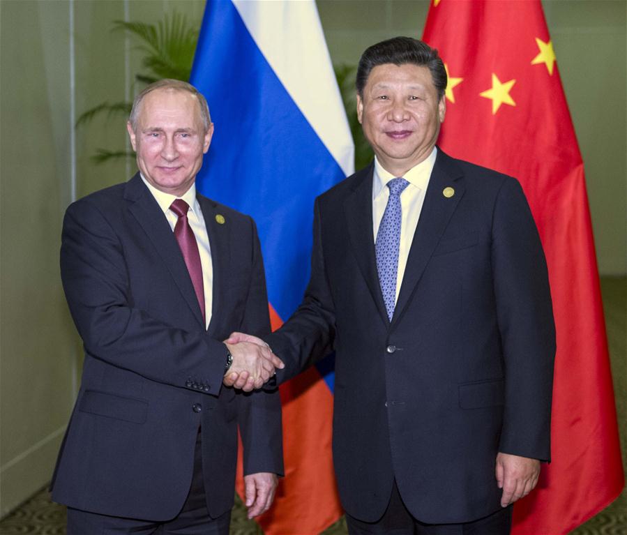 Xi e Putin se encontram para discutir livre comércio e la?os China-Rússia