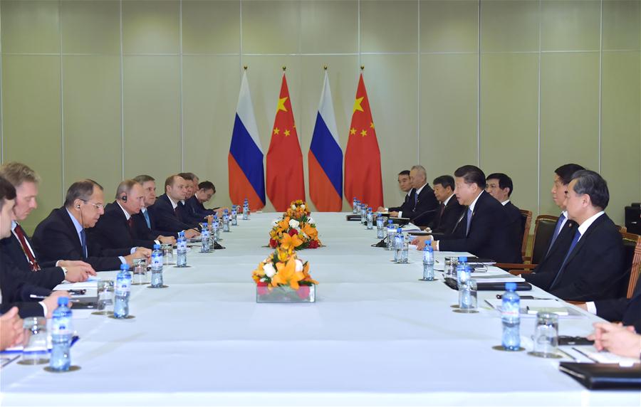 Xi e Putin se encontram para discutir livre comércio e la?os China-Rússia