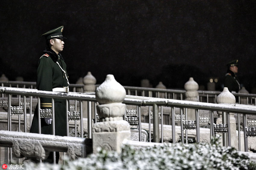 Beijing pintada de branco na primeira queda de neve do ano