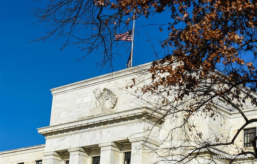 Reserva Federal dos EUA aumenta taxa de juro de referência e prevê mais aumentos para o próximo ano