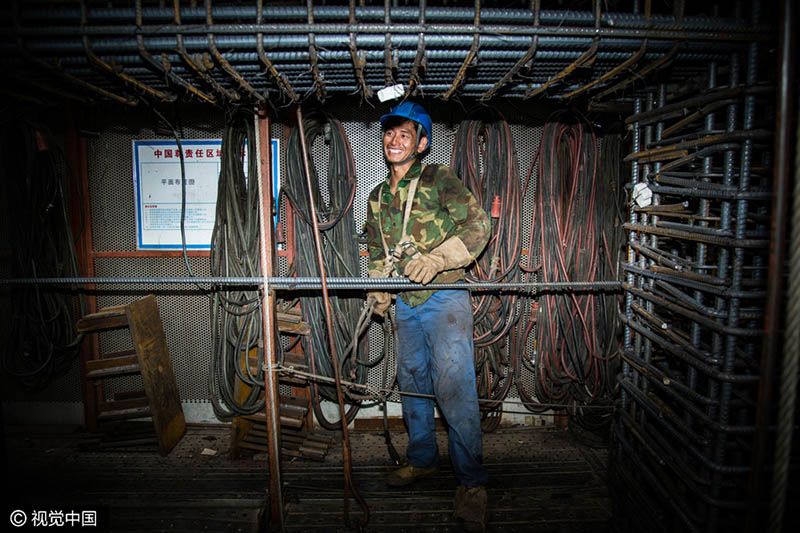 Os rostos por trás do edifício mais alto de Beijing