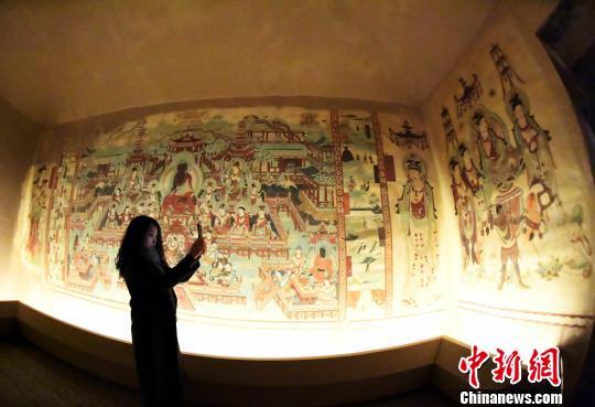 Exposi??o sobre as Cavernas de Dunhuang é realizada no sudoeste da China
