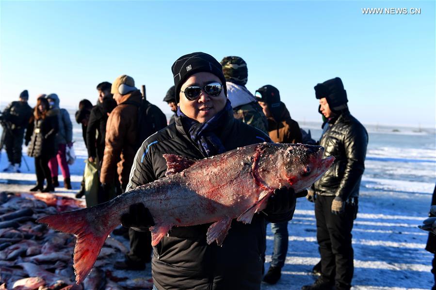 época de pesca de inverno iniciada com celebra??es no nordeste da China