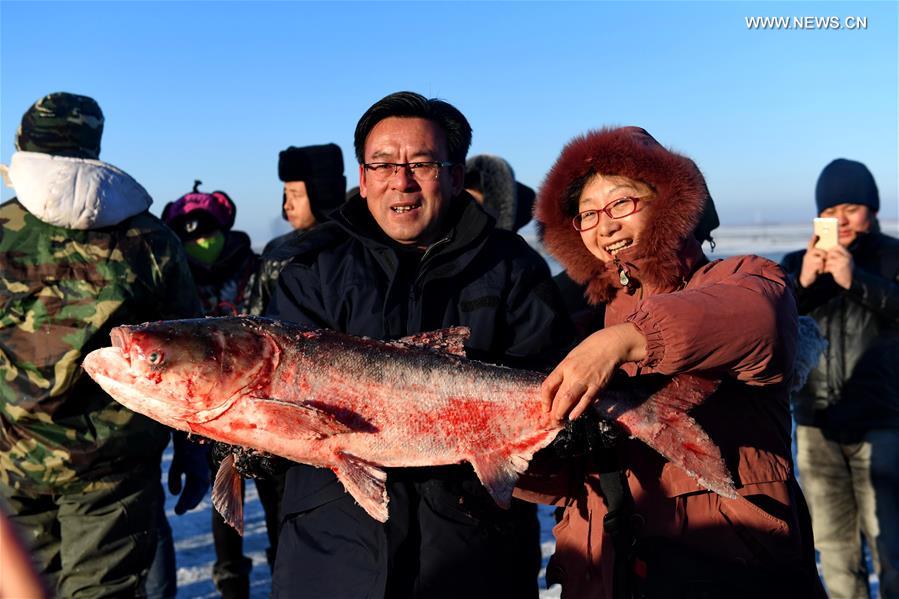época de pesca de inverno iniciada com celebra??es no nordeste da China