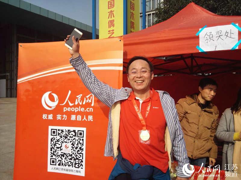 Diário do Povo Online organiza caminhada em comemora??o do seu 20o aniversário em Jiangsu