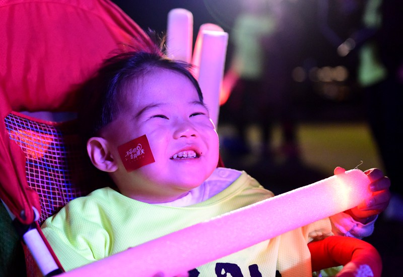 Diário do Povo Online organiza caminhada em comemora??o do seu 20o aniversário em Sanya