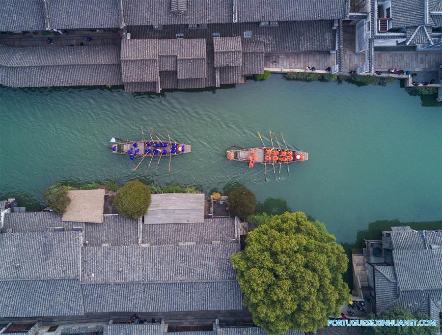 Competi??o de barco em Hangzhou celebra o Festival Sanyuesan