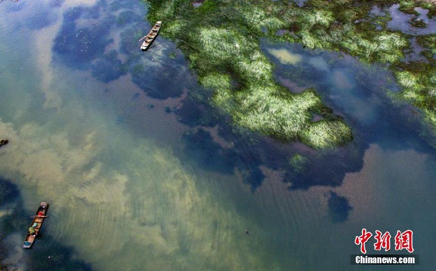 Galeria: P?r-do-sol sobre as águas do Lago das Fadas em Jiangxi