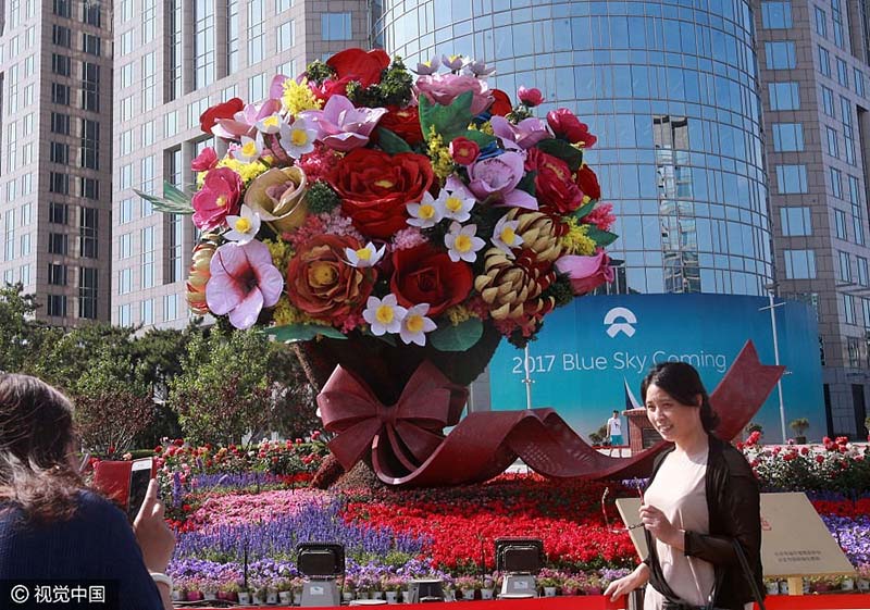 Capital chinesa decorada a rigor para o Fórum do Cintur?o e Rota em Beijing