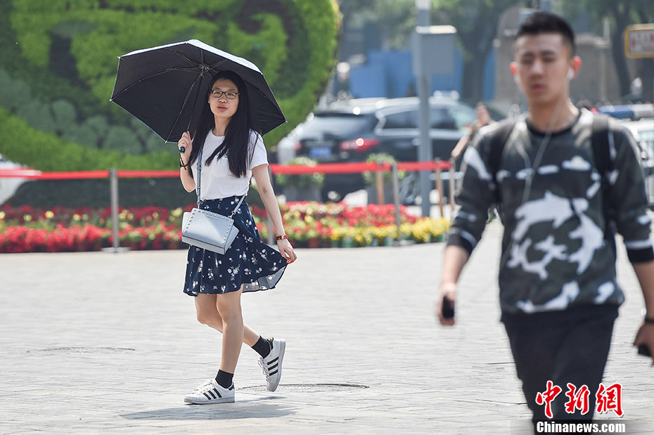 Termómetros sobem acima dos 35aC em Beijing