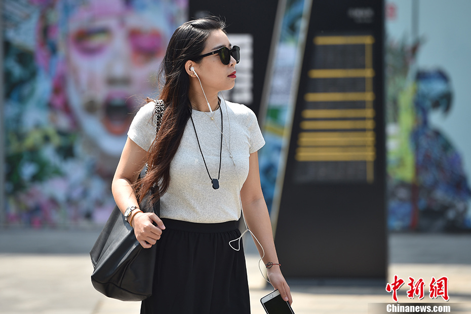 Termómetros sobem acima dos 35aC em Beijing