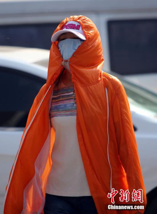 Termómetros sobem acima dos 35aC em Beijing