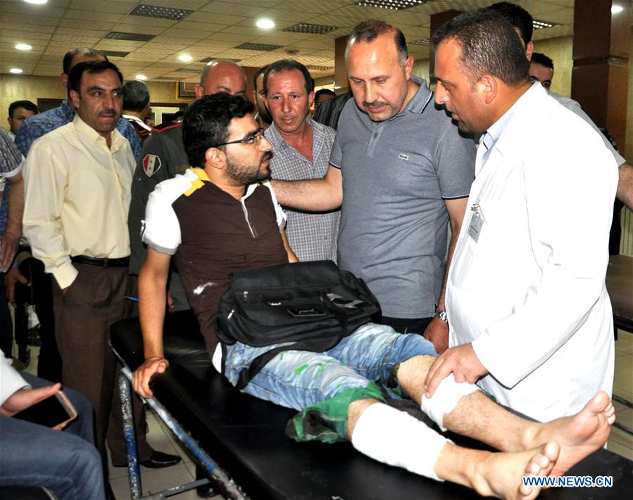 Ataque suicida mata 3 em esta??o de ?nibus no centro da Síria