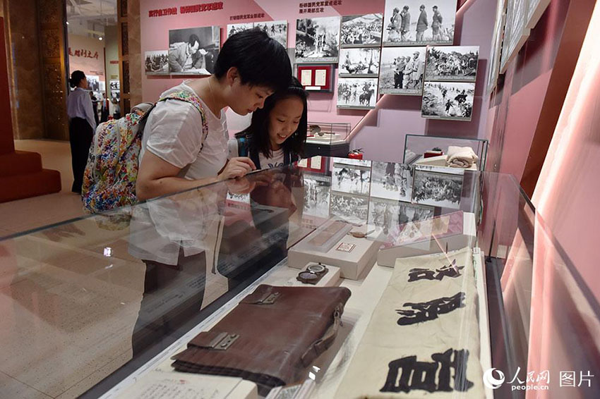 Exposi??o comemorativa do 90o aniversário do Exército de Liberta??o Popular é realizada em Beijing