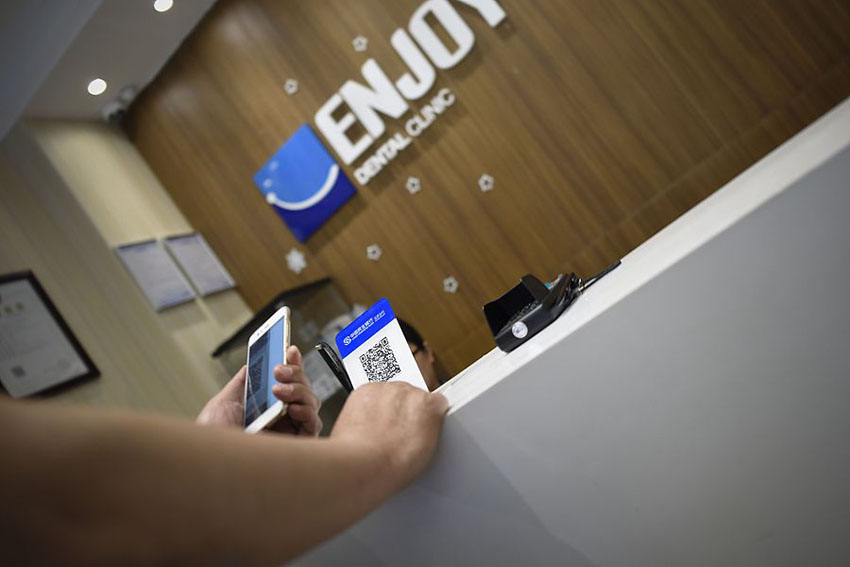 China em vias de se tornar primeiro país a parar de usar dinheiro físico