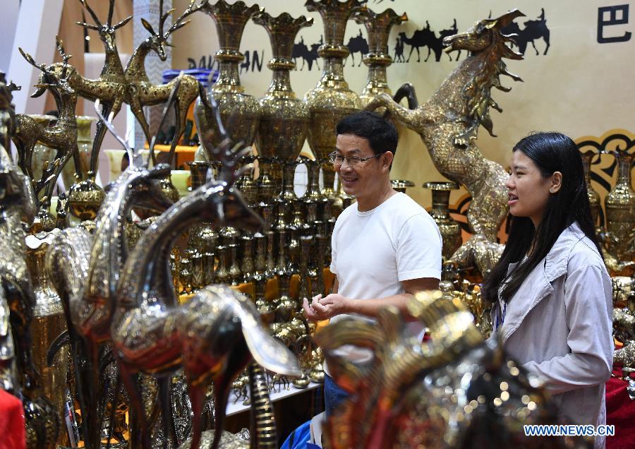 Expo China-ASEAN com participa??o de expositores de países ao longo do Cintur?o e Rota