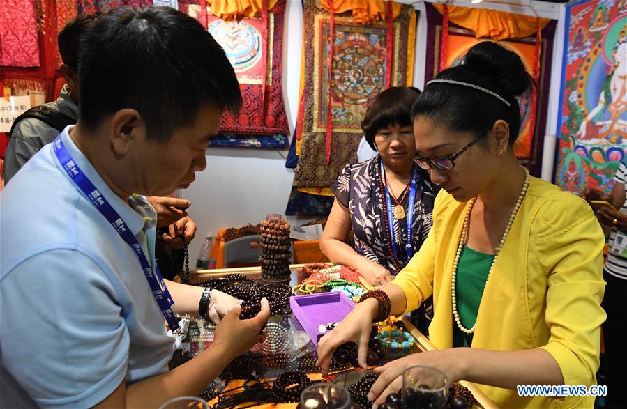 Expo China-ASEAN com participa??o de expositores de países ao longo do Cintur?o e Rota