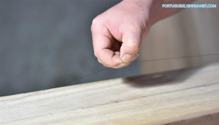 Wang Bing, herdeiro da heran?a cultural imaterial da cítara chinesa em Zunyi