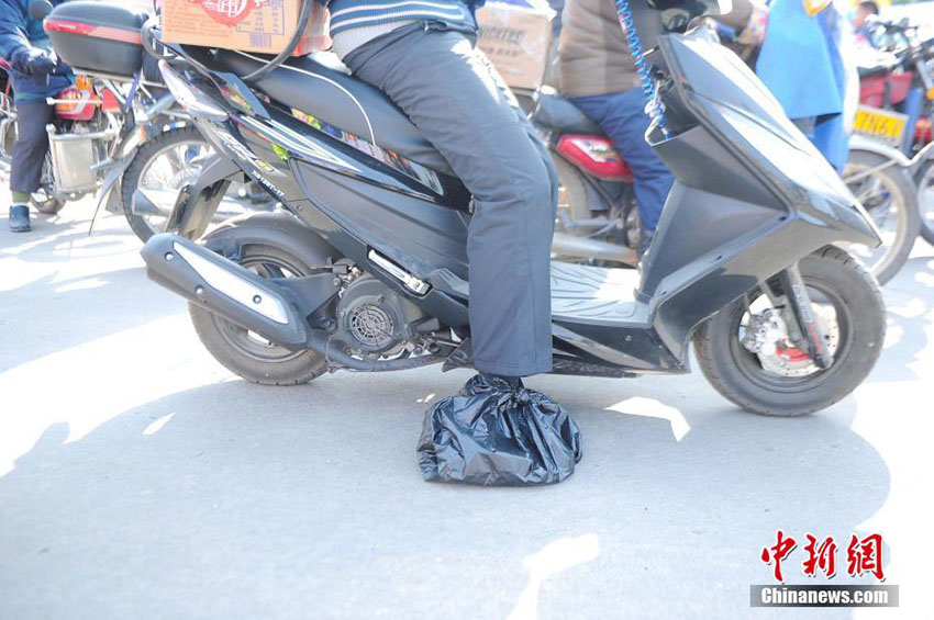 Ano Novo Chinês: Chineses regressam a casa de motocicleta