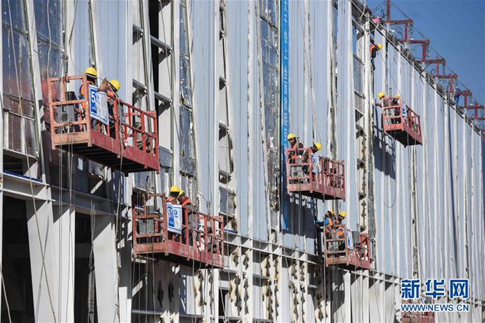 Galeria: Trabalhadores garantem constru??o do centro de servi?os em Xiongan durante Festival da Primavera