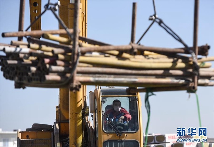 Galeria: Trabalhadores garantem constru??o do centro de servi?os em Xiongan durante Festival da Primavera