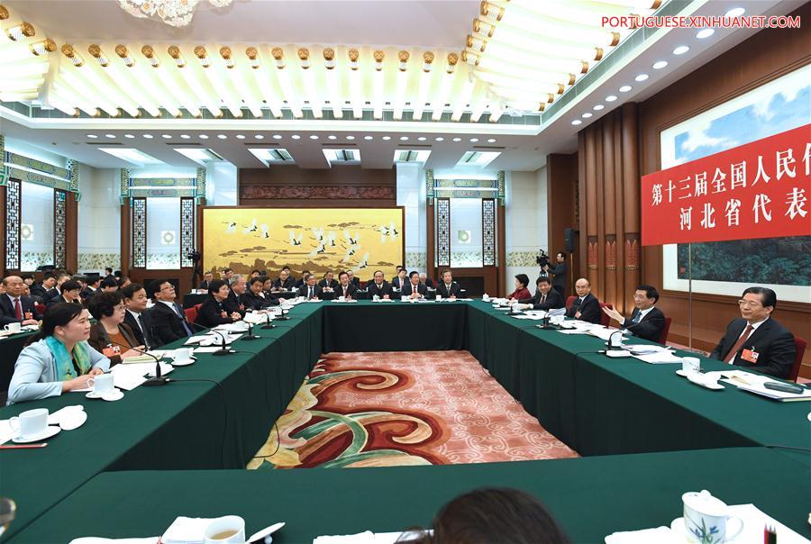 Líderes de alto escal?o se reúnem com legisladores nacionais e destacam status de núcleo de Xi