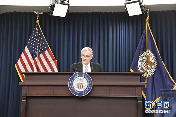 Reserva Federal dos EUA eleva taxa de juros e sinaliza mais dois aumentos de taxa em 2018