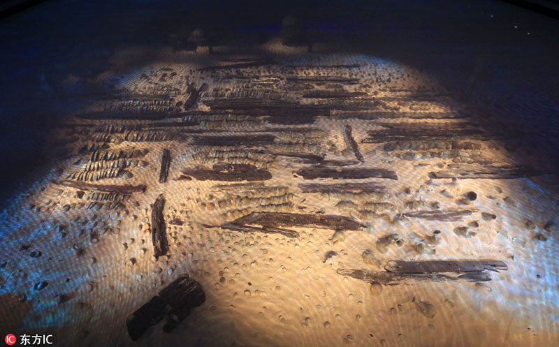 Mais de 10 mil relíquias de antigo navio naufragado exibidas em Hainan