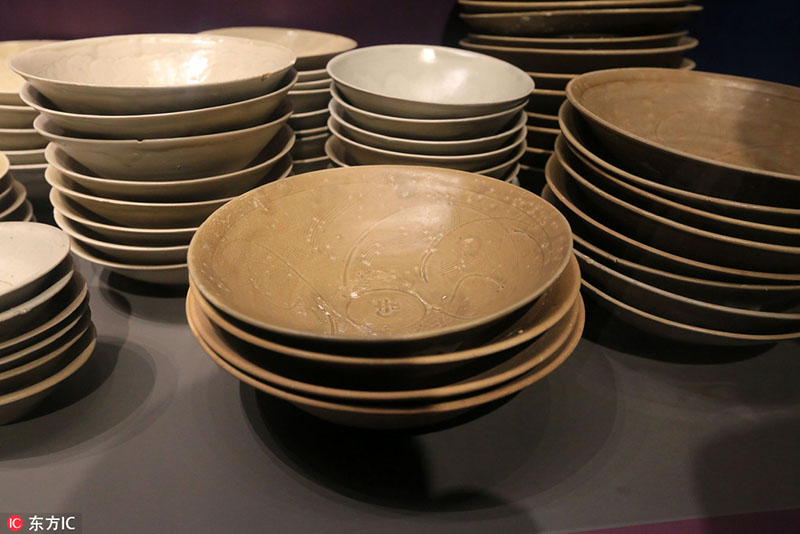 Mais de 10 mil relíquias de antigo navio naufragado exibidas em Hainan